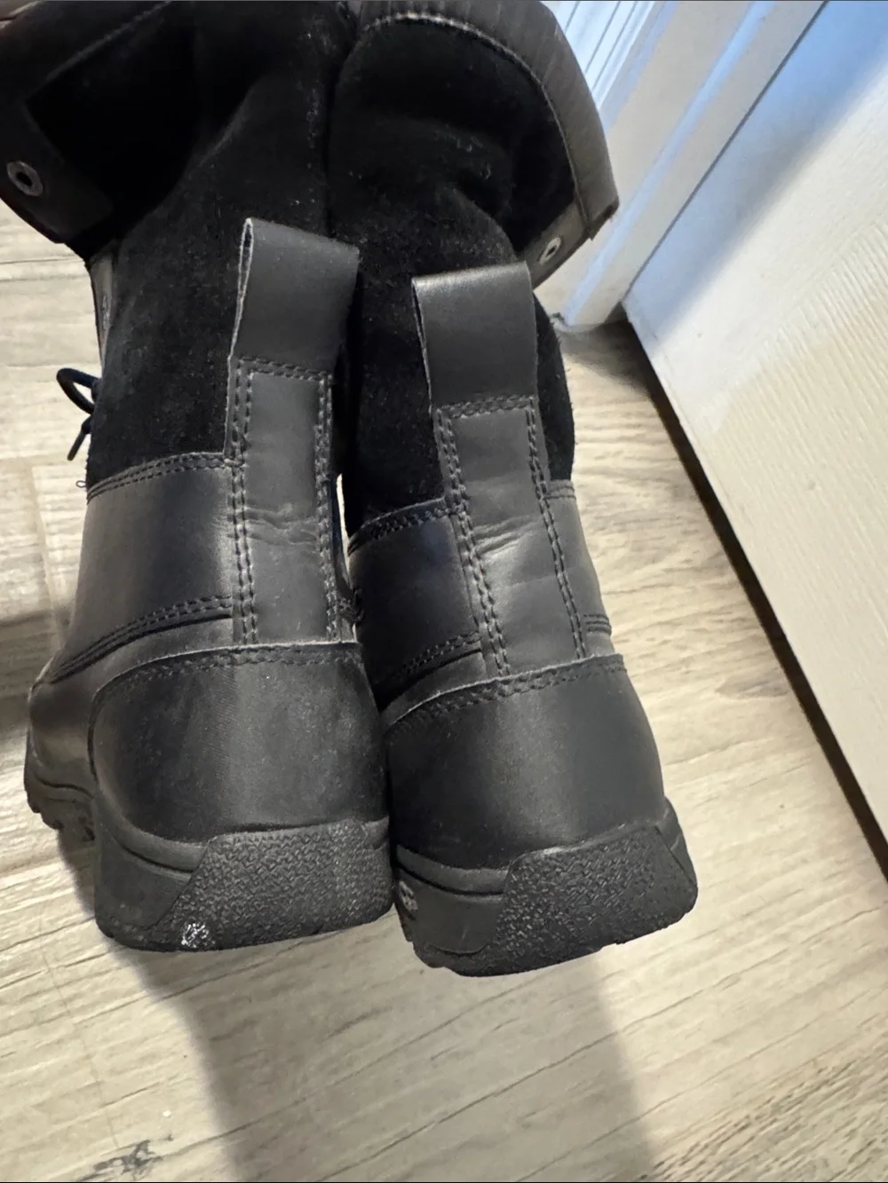UGG Adirondack water proof insulated lace up winter boots.
